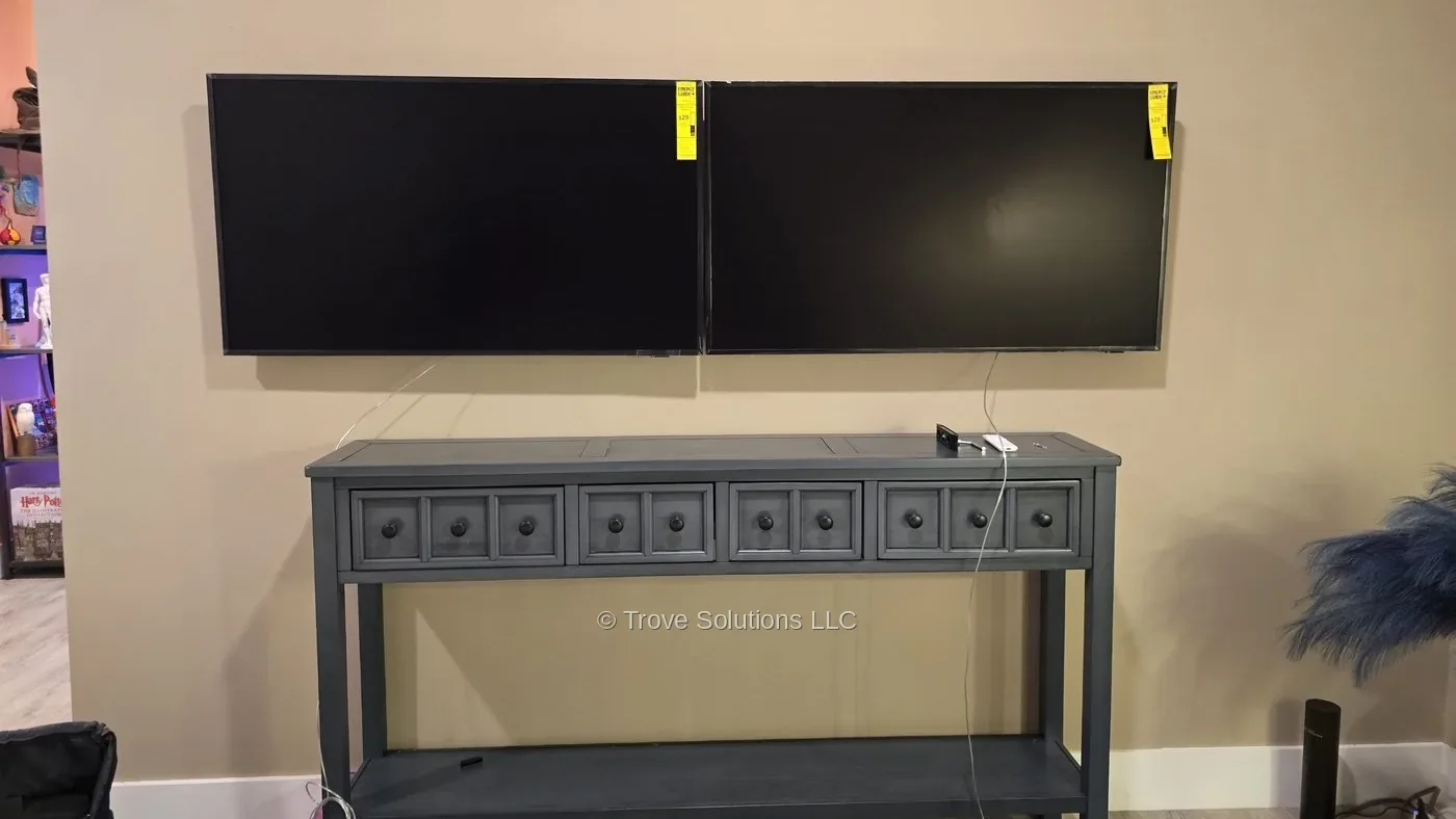 Two TVs mounted side by side sports betting setup Manhattan