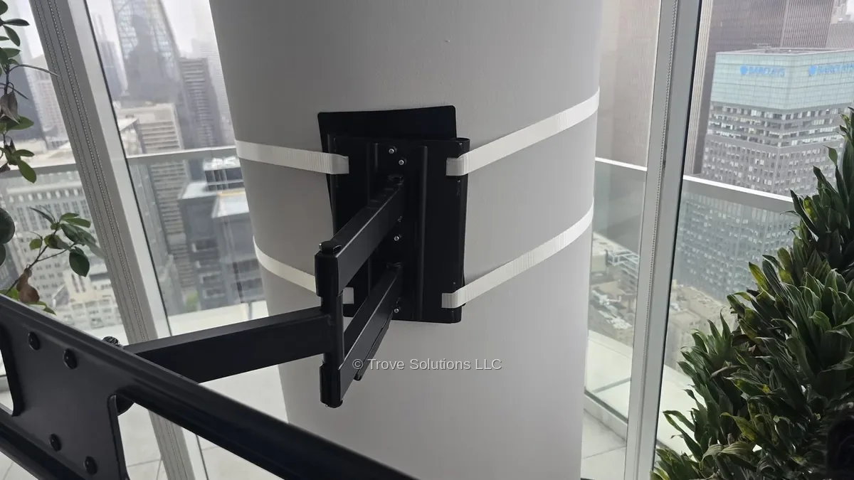 TV mount on concrete column using straps — no-drill installation Manhattan