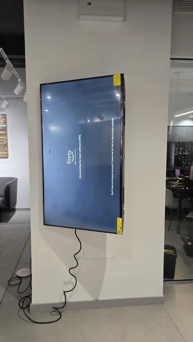 Vertical TV installation Manhattan office — Fire TV setup