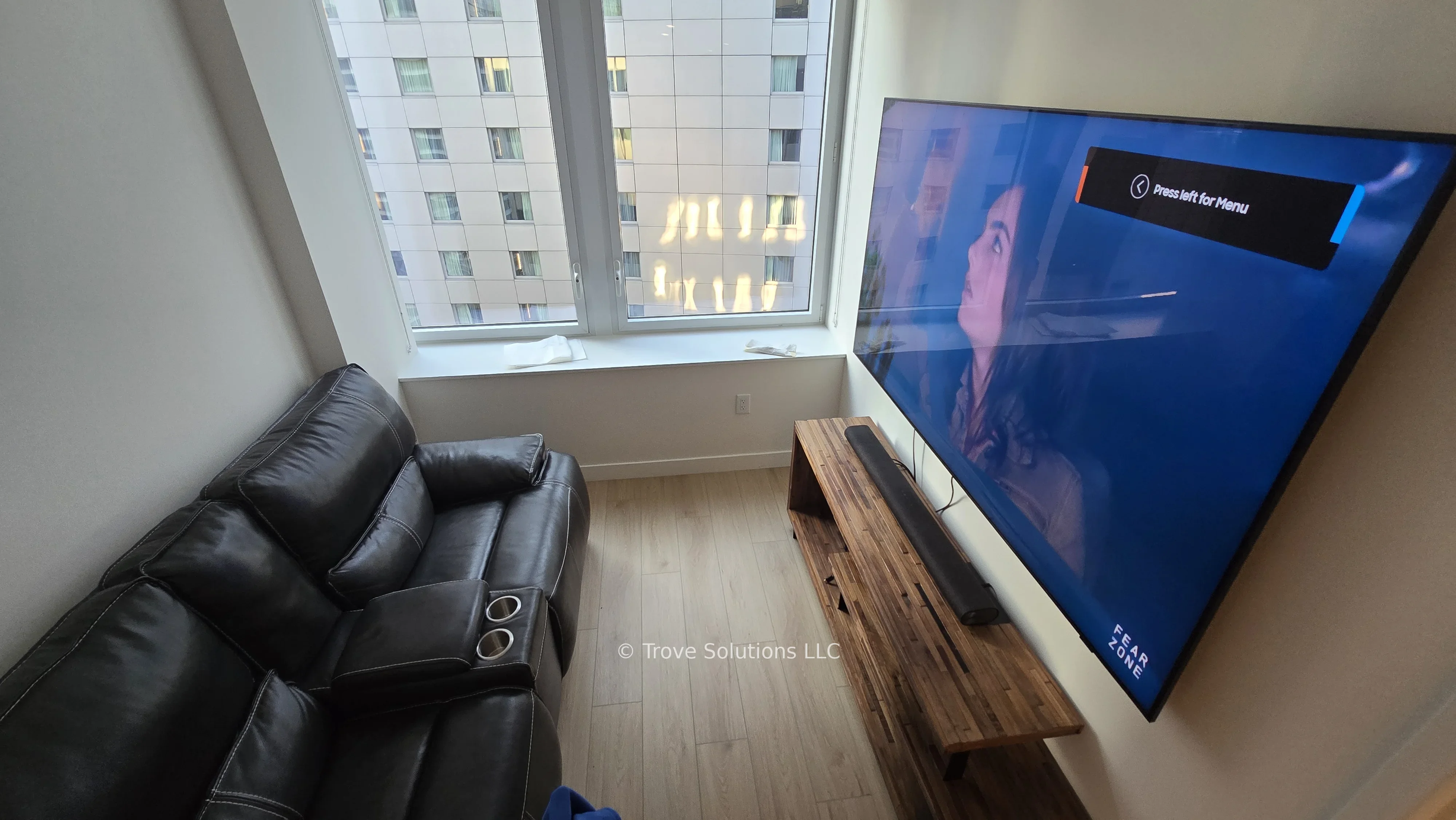 Samsung Frame TV installation on exposed brick wall Manhattan