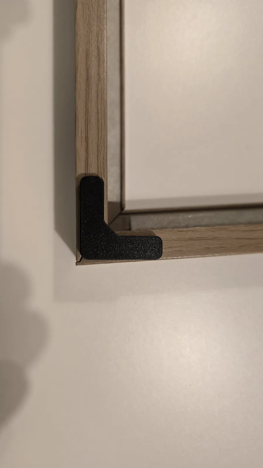 Finished frame corner with the connector in place